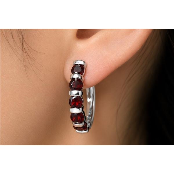 $240, silver(3.73g), garnet (0.8ct) earring, retail value $240