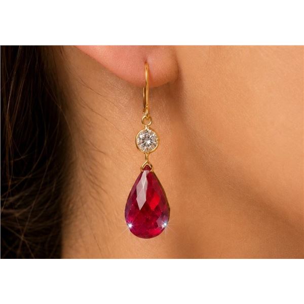 $1600, 10k(1.7g), ruby (7ct)earring, retail value $1600
