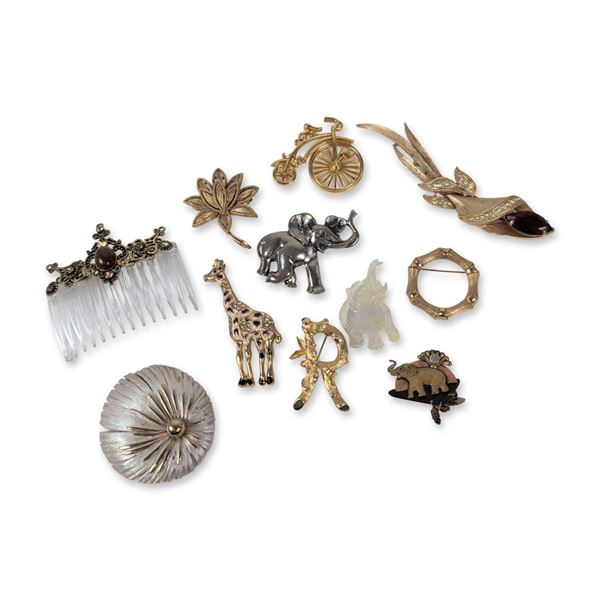 An Assortment of Eleven Vintage Costume Jewelry Pieces