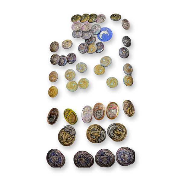 AN ASSORTMENT OF DIVISION THREE GLASS BUTTONS