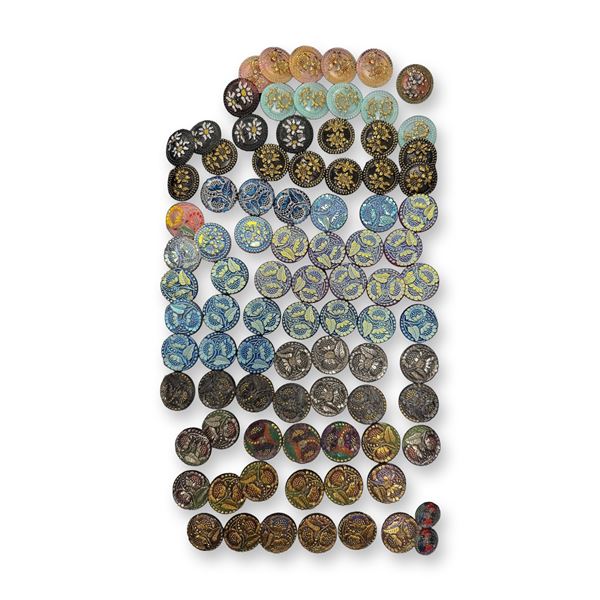 AN ASSORTMENT OF DIVISION THREE GLASS BUTTONS