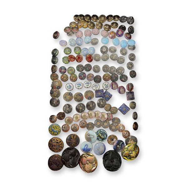 AN ASSORTMENT OF DIVISION THREE GLASS BUTTONS