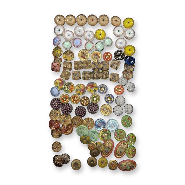 AN ASSORTMENT OF DIVISION THREE GLASS BUTTONS