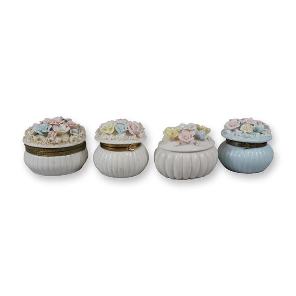 A Lot of Four Japanese Porcelain Floral Trinket Boxes