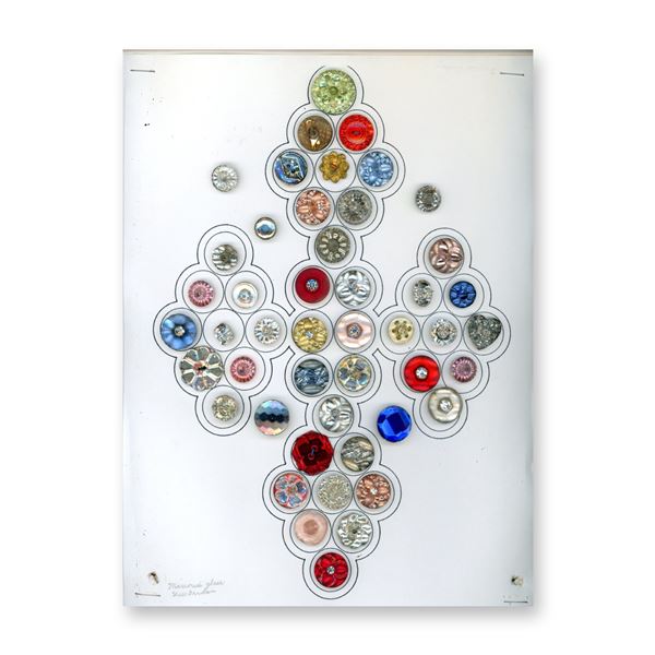A CARD OF DIVISION THREE GLASS BUTTONS