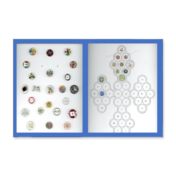 A CARD PLUS OF DIVISION THREE GLASS BUTTONS