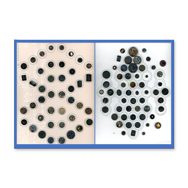 AN ASSORTEMENT OF BLACK GLASS BUTTONS