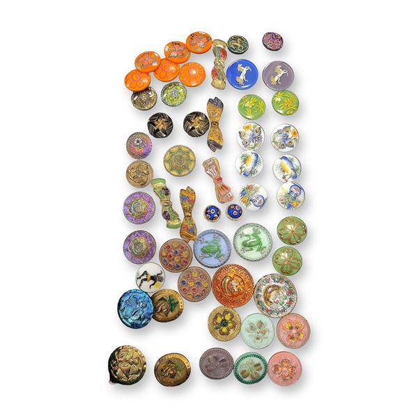 AN ASSORTMENT OF DIVISION THREE GLASS BUTTONS