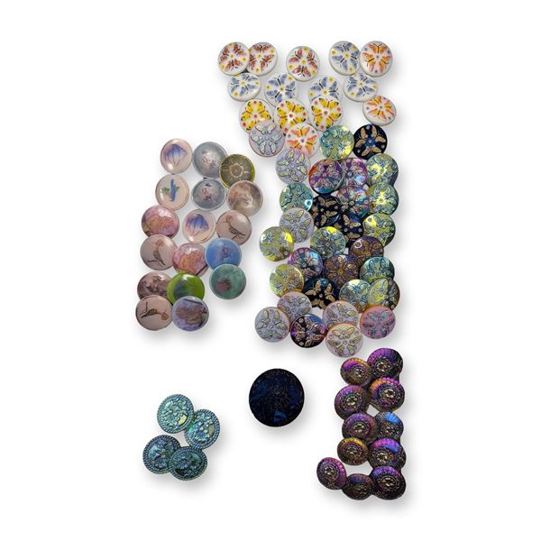 AN ASSORTMENT OF DIVISION THREE GLASS BUTTONS