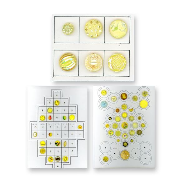 2 PLUS CARDS OF ASSORTED WEST GERMAN YELLOW GLASS BUTTONS