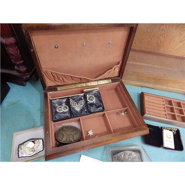 dresser top jewelry box with belt buckles and costume jewelry