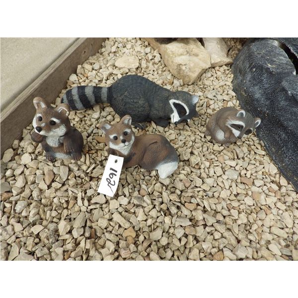 raccoons and foxes lawn ornaments