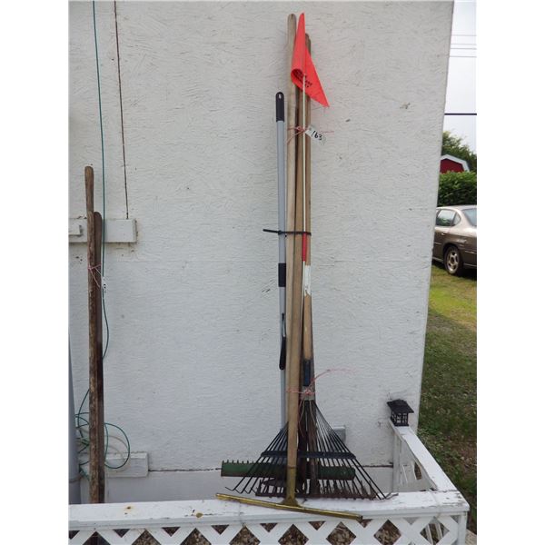 bundle of assorted garden tools