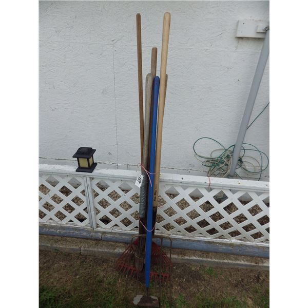 bundle of assorted garden tools