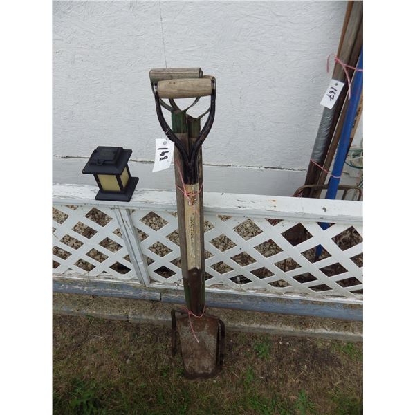 bundle of assorted garden tools
