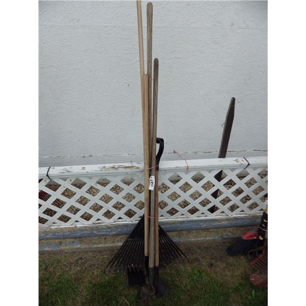 bundle of assorted garden tools