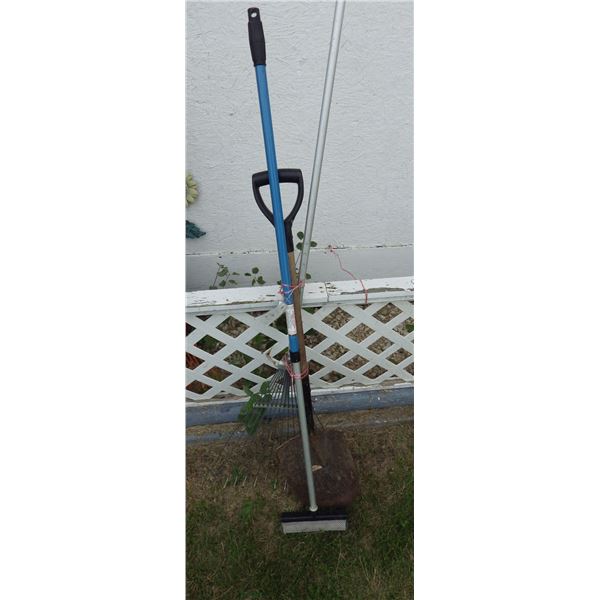bundle of assorted garden tools