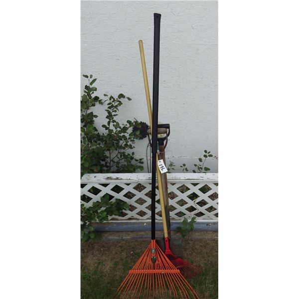 bundle of assorted garden tools