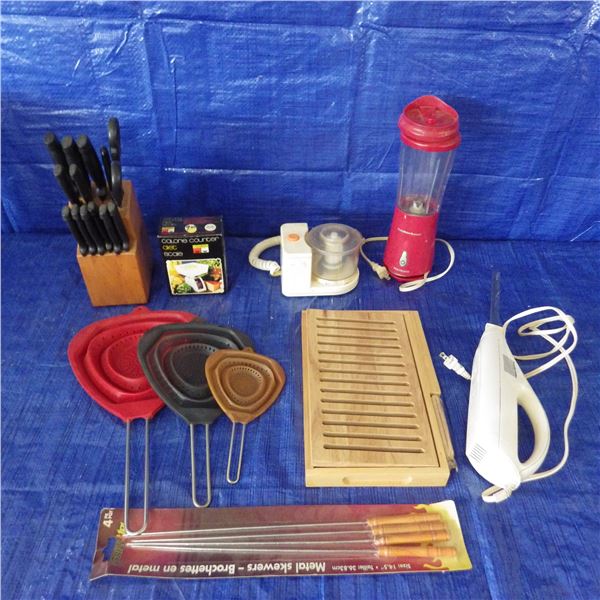 Electric knife , cutting board , strainers, Kitchen items