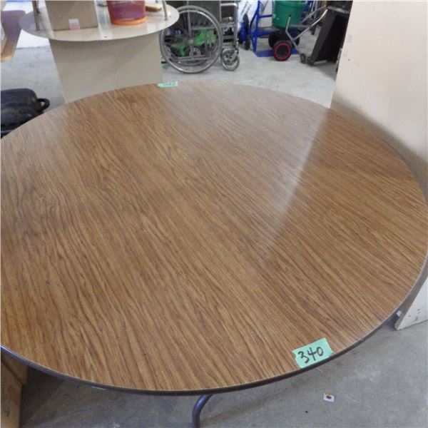 Round table with folding legs