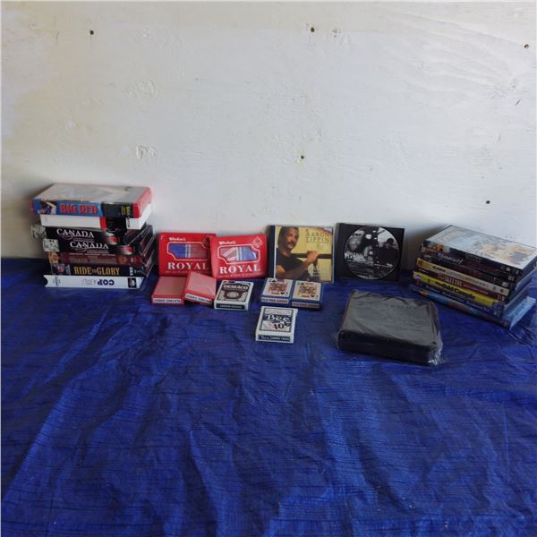 VHS  tapes, cds, and playing cards