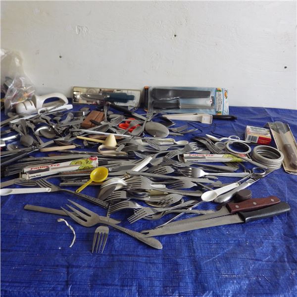 Large assortment of kitchen utensils