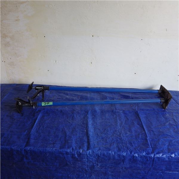Pair of load stabilizing bars