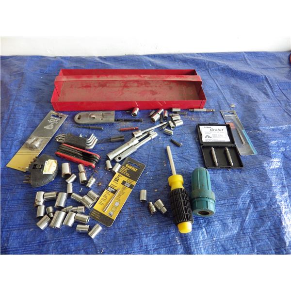 Assortment of sockets and small tools