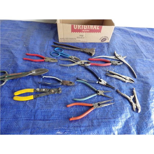 pliers, vice grips, tin snips, etc