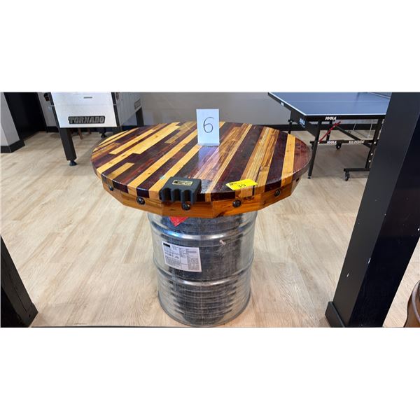 39" DIAMETER WOODEN TABLE TOP ON SILVER 50 GALLON BARREL DRUM - APPROX. 3FT HIGH