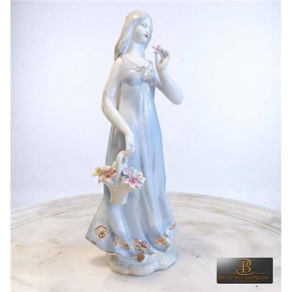 Porcelain Figurine of Woman with Flower Basket
