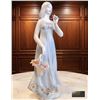 Image 2 : Porcelain Figurine of Woman with Flower Basket