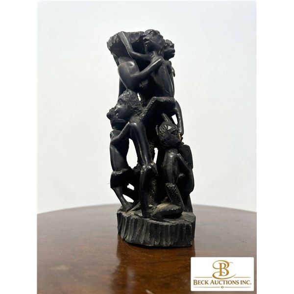 Hand-Carved Ebony African Sculpture of Six Figures