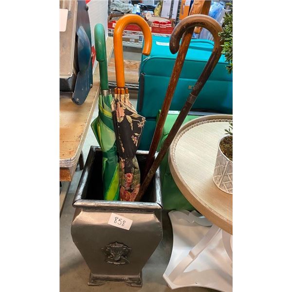 FLOWER POT WITH 2 CANES AND 2 UMBRELLAS
