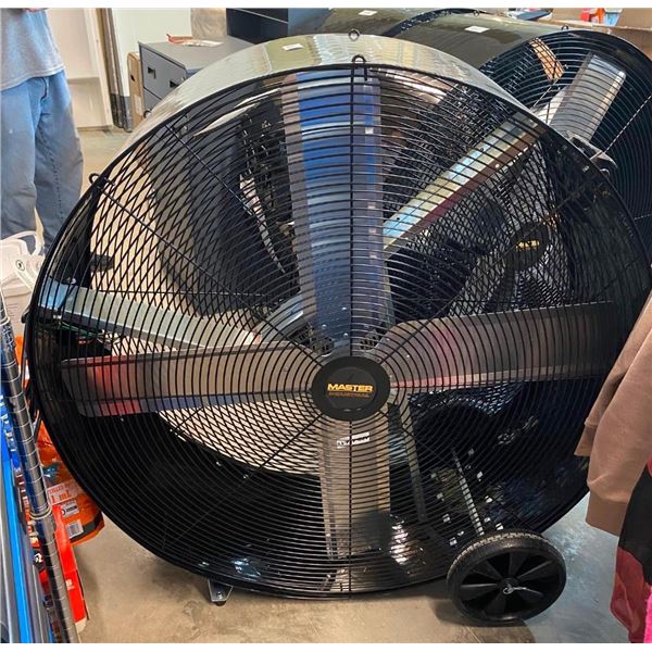 42IN MASTER INDUSTRIAL BARREL FAN ON WHEELS - HAS SMALL DENT NOT AFFECTING ANYTHING