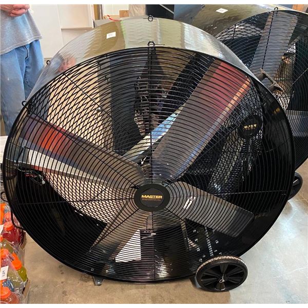 42IN MASTER INDUSTRIAL BARREL FAN ON WHEELS - HAS SMALL DENT NOT AFFECTING ANYTHING