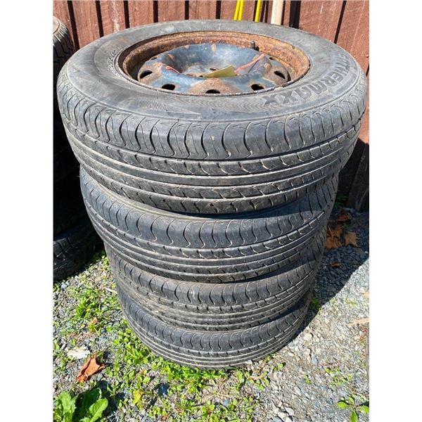 SET OF 4 OF 215/70 R15 ON RIMS