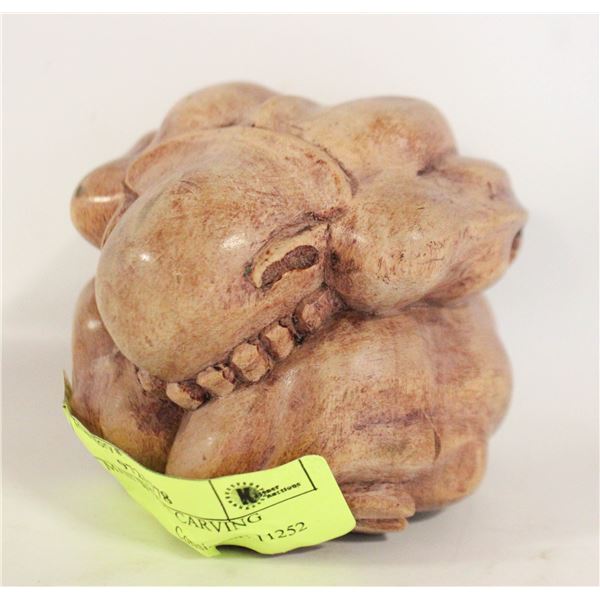 CURLED MAN WOOD CARVING