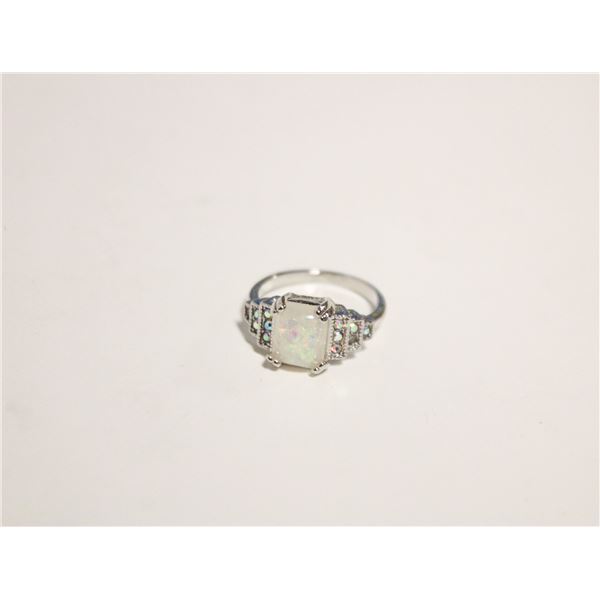 11)  SILVER TONE WITH LAB CREATED OPAL