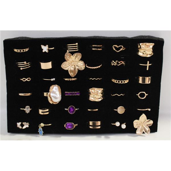 TRAY W/36 GOLDTONE RINGS