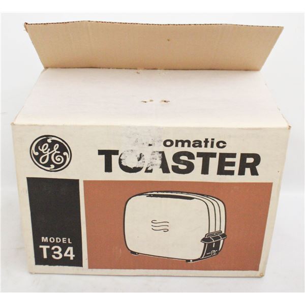 1955 GENERAL ELECTRIC TOASTER IN NEW CONDITION.