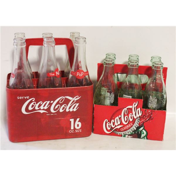 6 GREEN GLASS COKE BOTTLES IN CARRIER &