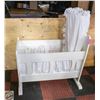 Image 1 : VINTAGE WHITE WOODEN DOLL CRADLE WITH PROMINENT