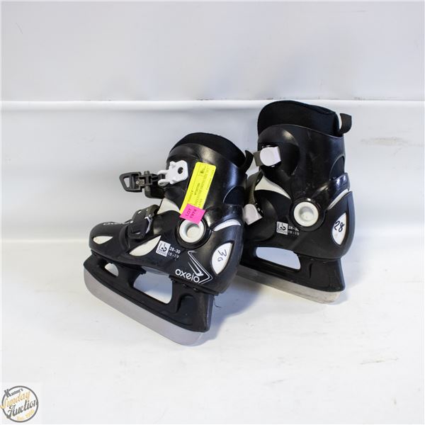 USED OXELO CHILDRENS SIZE 10.5 ICE SKATES