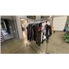 Image 1 : MOBILE WARDROBE RACK FILLED WITH ASSORTED CLOTHING