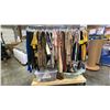 Image 1 : MOBILE WARDROBE RACK FILLED WITH ASSORTED CLOTHING