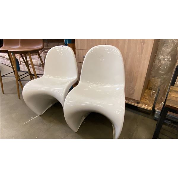 PAIR OF SCULPTED WHITE PLASTIC MODERN DESIGN SIDE CHAIRS