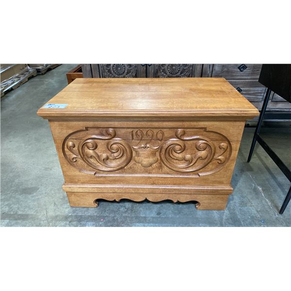 CARVED FRONT SOLID OAK LIDDED TRUNK WITH DOVE-TAILED CONSTRUCTION