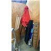 Image 2 : GROUP OF 7 ASSORTED PATIO UMBRELLAS AND BARREL OF WOODEN POLES