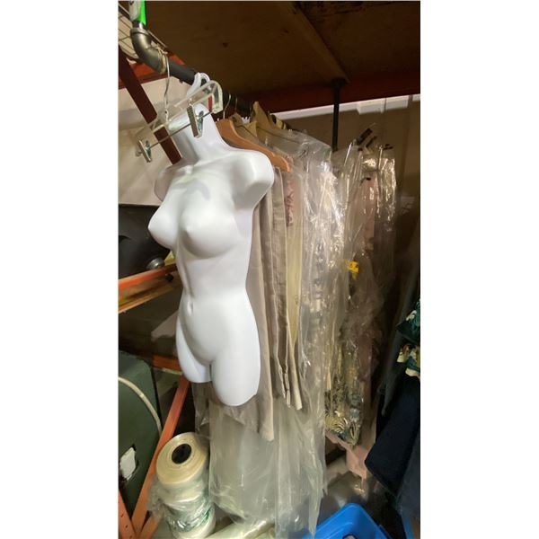 ONE RACK OF ASSORTED CLOTHING AND CURTAINS (MOSTLY CURTAINS) *RACK NOT INCLUDED*
